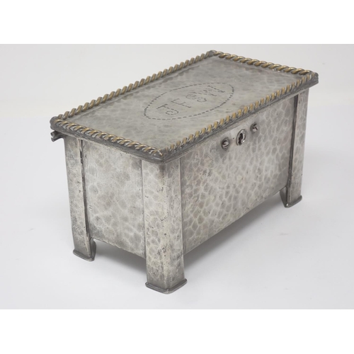 332 - A hammered pewter Arts and Crafts two division Tea Caddy in the form of a Black Mountain Coffer with... 