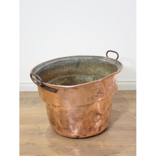 333A - A 19th Century oval copper Log Bin, the tapering stepped sides with iron carrying handles, 19 in H x... 