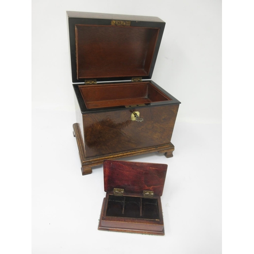 347 - A walnut Jewel Box with hinged lid enclosing tray and small inlaid compartment on ogee bracket feet,... 