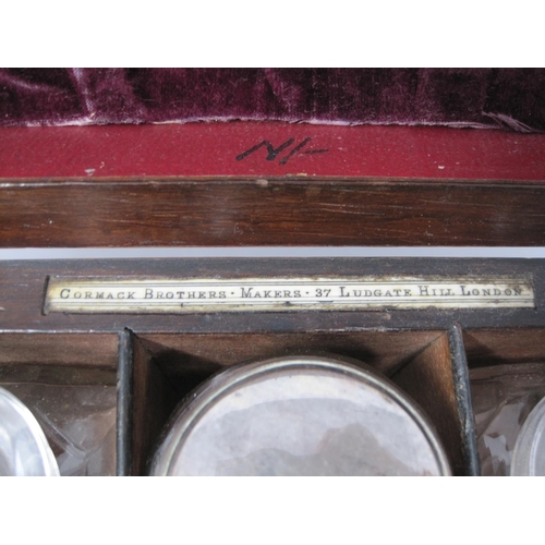 349 - A Victorian rosewood travelling Box with eleven silver plate bottles and boxes, the front section wi... 