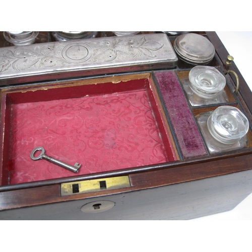 349 - A Victorian rosewood travelling Box with eleven silver plate bottles and boxes, the front section wi... 