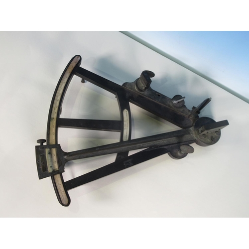 353 - An ebony and brass Octant by C Wilson, late Crie & Wilson, London, the scale divided to 100 degrees,... 