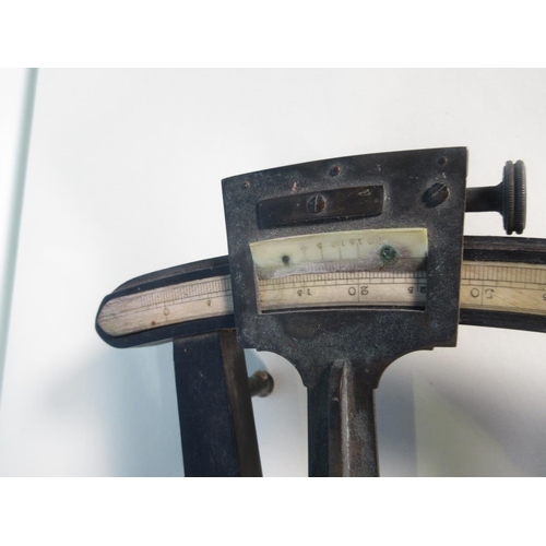 353 - An ebony and brass Octant by C Wilson, late Crie & Wilson, London, the scale divided to 100 degrees,... 