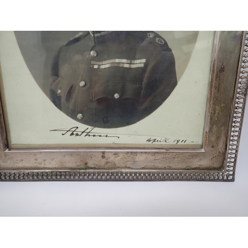 38 - A Geo V silver Photograph frame with pierced gallery edge, containing a signed photograph of Prince ... 