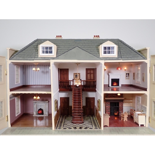 383 - A large Doll's House in the Georgian manner, with removable front panel revealing a lit fitted inter... 