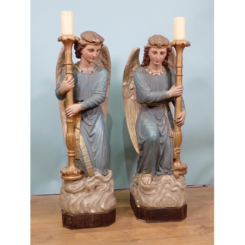 396 - A pair of 19th Century painted plaster standing Candle Stands in the form of angels, painted letteri... 