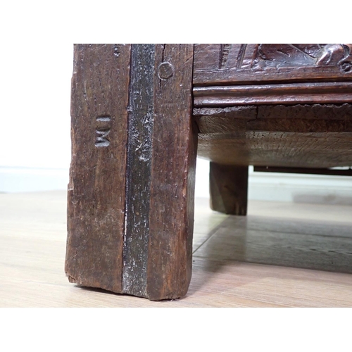 400 - A 17th Century oak three panel Coffer with moulded lid above grape and thistle frieze and diamond ca... 