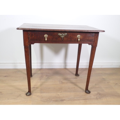 402 - An early 18th Century oak Side Table with moulded two piece top fitted single frieze drawer mounted ... 