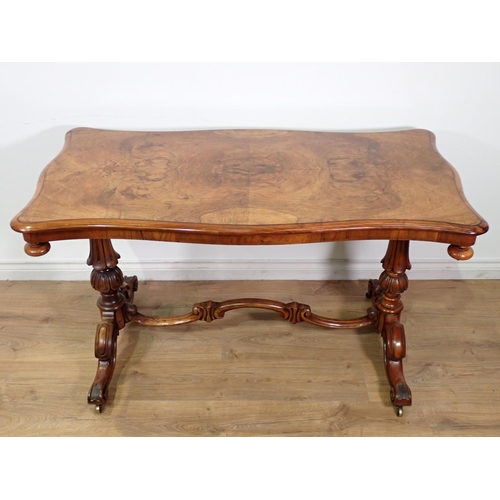 407 - A Victorian burr walnut  veneered Centre Table with quartered shaped top mounted on baluster shaped ... 