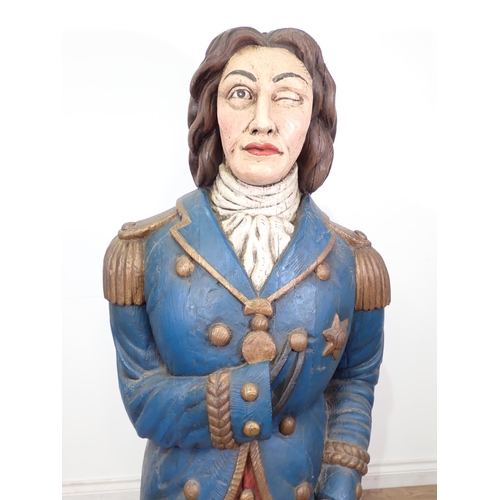 410 - A carved wooden Figure of Nelson in the manner of a Ships Figurehead, having painted detail 5ft H