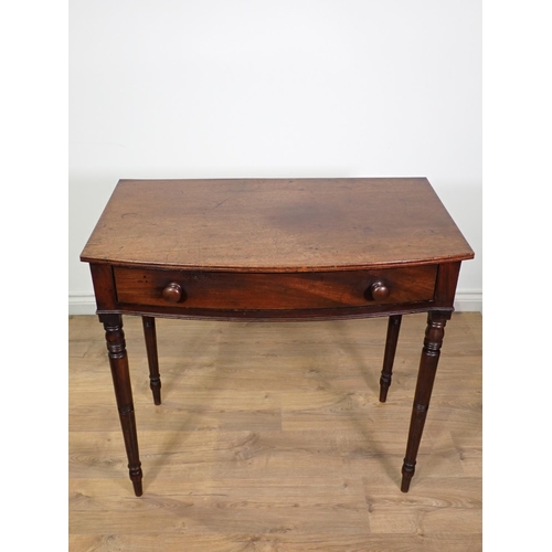 424 - A 19th Century mahogany bow fronted Side Table fitted single frieze drawer mounted upon turned suppo... 