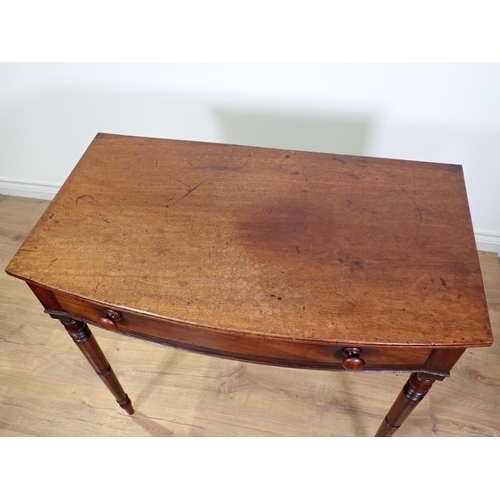 424 - A 19th Century mahogany bow fronted Side Table fitted single frieze drawer mounted upon turned suppo... 