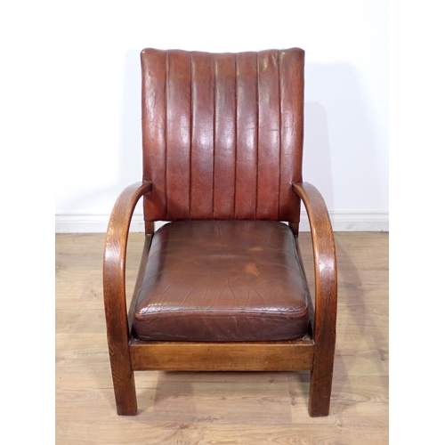 425 - An oak framed Art Deco Armchair with brown leather upholstery 2ft 11in H x 2ft W