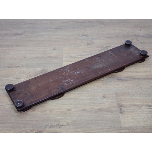 428 - A 19th Century mahogany Book Trough with shaped folding ends mounted upon turned feet 2ft 4in W x 9i... 