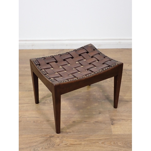 429 - A 20th Century mahogany Stool with leather and brass studded strapwork top by Simpsons of Kendal 1ft... 