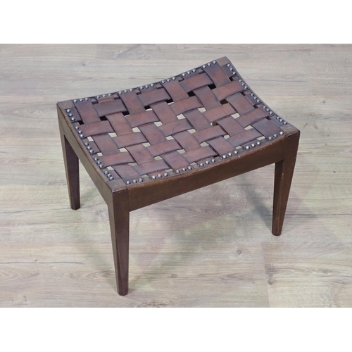 429 - A 20th Century mahogany Stool with leather and brass studded strapwork top by Simpsons of Kendal 1ft... 