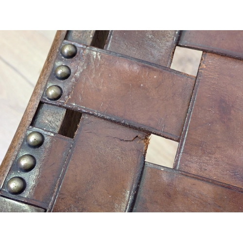 429 - A 20th Century mahogany Stool with leather and brass studded strapwork top by Simpsons of Kendal 1ft... 