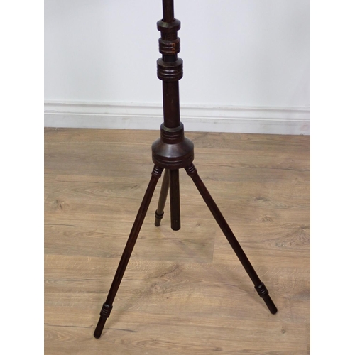 430 - An Aesthetic movement mixed wood adjustable Music Stand on three turned supports