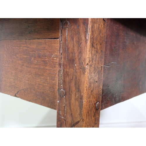 433 - An antique oak Table with four plank cleated top and raised on squared supports, 3ft 9in L x 2ft 4in... 