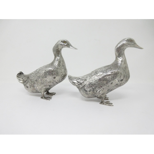 44 - A pair of Continental silver Ducks, import marks London 1966, total weight 870 grams