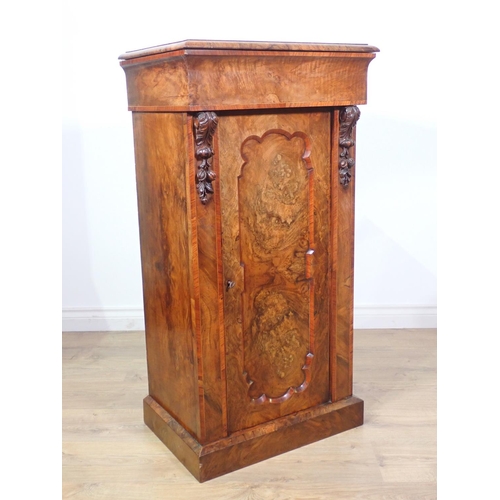 443 - A Victorian burr walnut Side Cabinet with moulded top, single panelled door enclosing lined shelves ... 