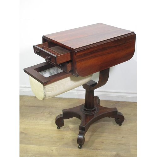 445 - A Regency Work Table with drop leaves, fitted two frieze drawers and sliding basket, raised on an oc... 