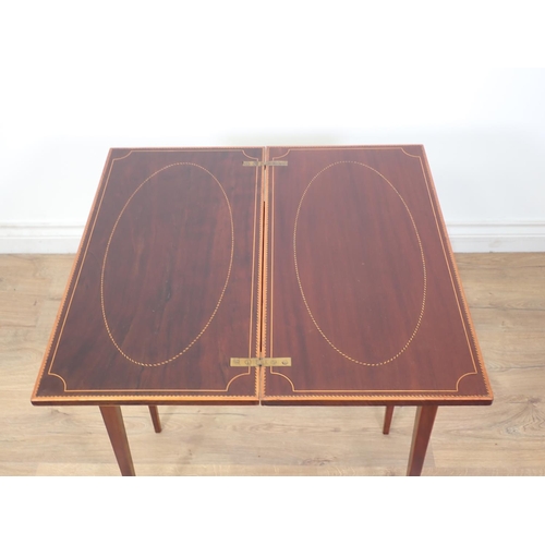 450 - An Edwardian mahogany Tea Table of small proportions by James Hicks, Lower Pembroke, St Dublin, the ... 