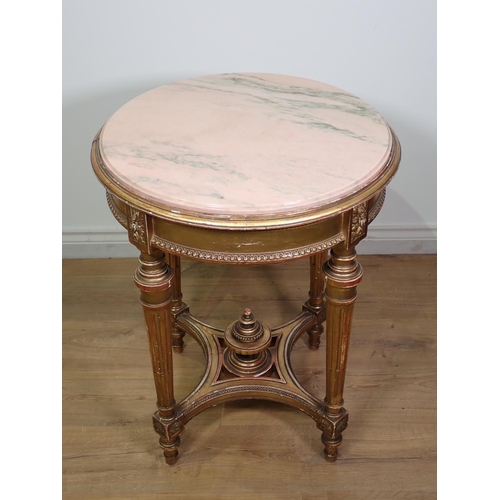 472 - A gilt circular Centre Table with pink veined marble top, the base with four fluted turned supports ... 