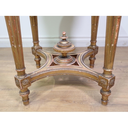 472 - A gilt circular Centre Table with pink veined marble top, the base with four fluted turned supports ... 