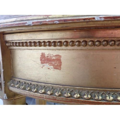 472 - A gilt circular Centre Table with pink veined marble top, the base with four fluted turned supports ... 