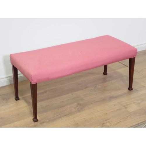 488 - An antique mahogany Window Seat, the stuff over top above square tapered legs with spade feet, 43 in... 