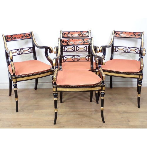 489 - A set of four decorated Regency style Armchairs, the pierced bar backs and swept scroll arms above c... 