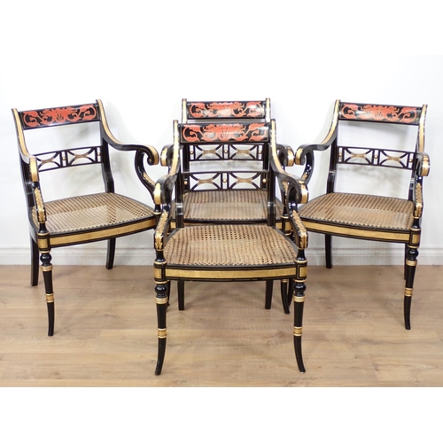 489 - A set of four decorated Regency style Armchairs, the pierced bar backs and swept scroll arms above c... 