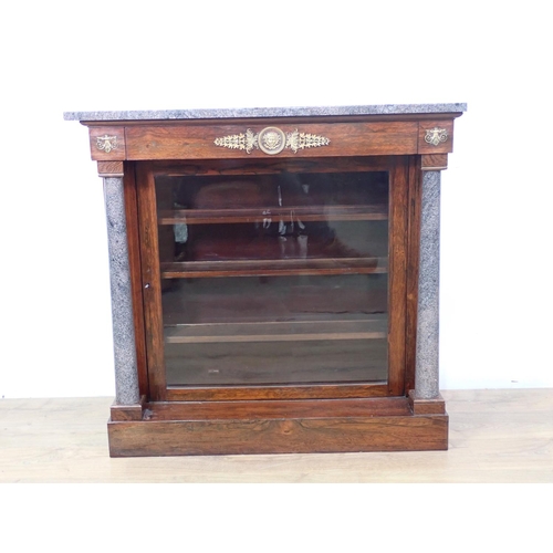 496 - A Regency rosewood Pier Cabinet with granite top and turned columns flanking single glazed door, fit... 