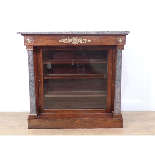 496 - A Regency rosewood Pier Cabinet with granite top and turned columns flanking single glazed door, fit... 