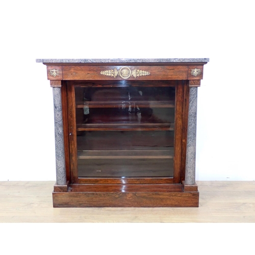 496 - A Regency rosewood Pier Cabinet with granite top and turned columns flanking single glazed door, fit... 