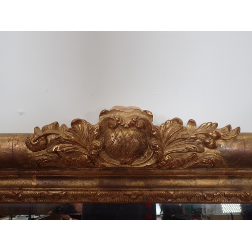 497 - A large gilt-framed Wall Mirror, 4ft 10in x 4ft 2in