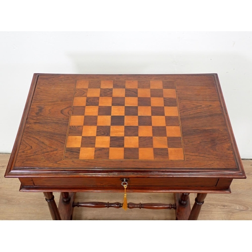 515 - A Victorian rosewood Work Table with inlaid chessboard top, sliding basket, raised on turned support... 