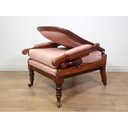 517 - A 19th Century folding Campaign Chair with shaped adjustable upholstered back, upholstered arm pads ... 