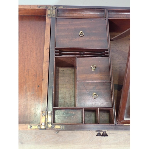 526 - A 19th Century mahogany Washstand with folding hinged top opening to reveal an easel mirror and cove... 