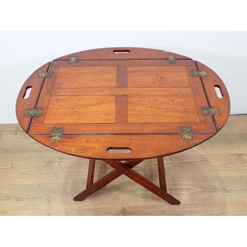 532 - A 19th Century mahogany Butler's Tray on stand, the tray having four folding sides with pierced hand... 