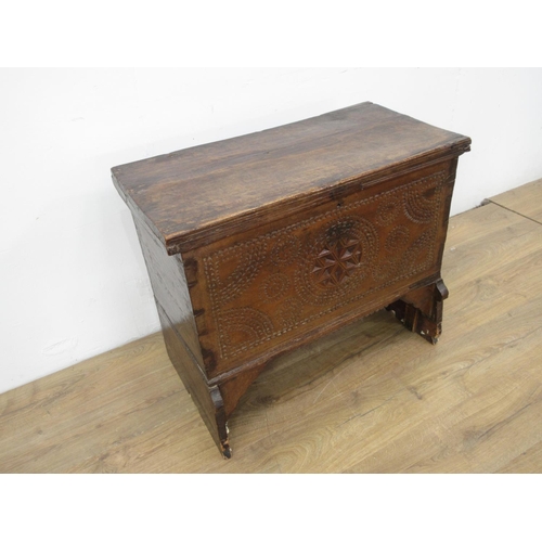 533 - A small 18th Century Continental walnut Coffer with hinged cover, carved front and on shaped support... 