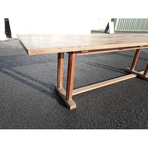 535 - Gordon Russell, A long oak Refectory Table with  six chamfered supports and 