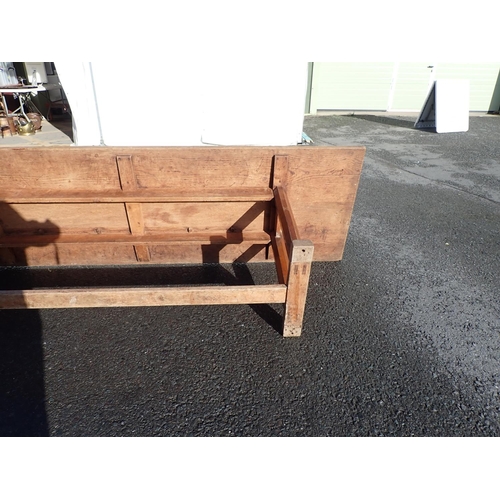 535 - Gordon Russell, A long oak Refectory Table with  six chamfered supports and 