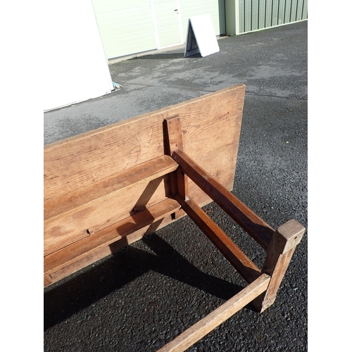 535 - Gordon Russell, A long oak Refectory Table with  six chamfered supports and 