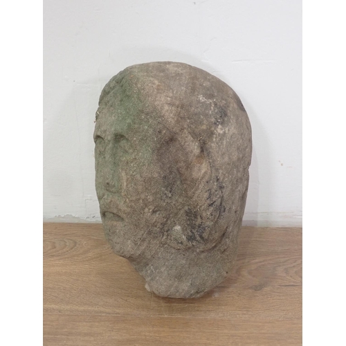 561 - A late Medieval 15th or early 16th Century carved stone female Head 12in H