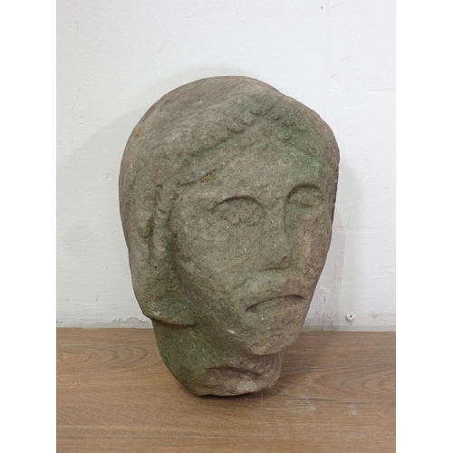 561 - A late Medieval 15th or early 16th Century carved stone female Head 12in H