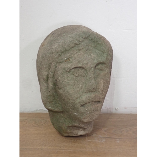 561 - A late Medieval 15th or early 16th Century carved stone female Head 12in H