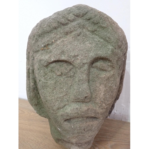 561 - A late Medieval 15th or early 16th Century carved stone female Head 12in H