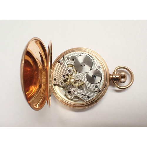 66 - A 9ct gold open faced Pocket Watch, the white enamel dial with Arabic numerals and subsidiary dial i... 